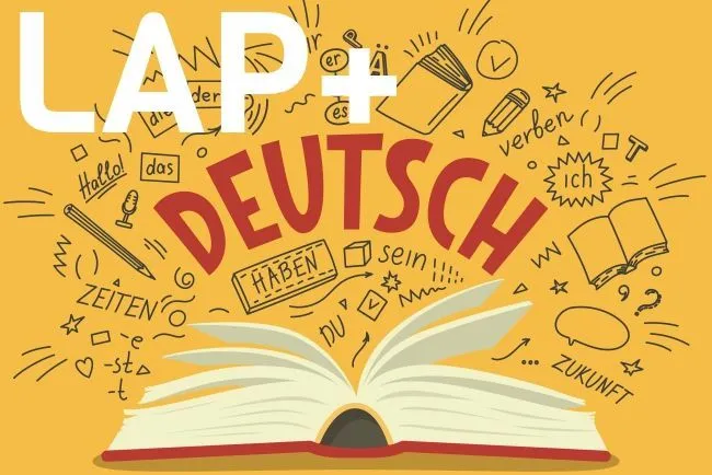 Aufgeklapptes Buch vor gelbem Hintergrund